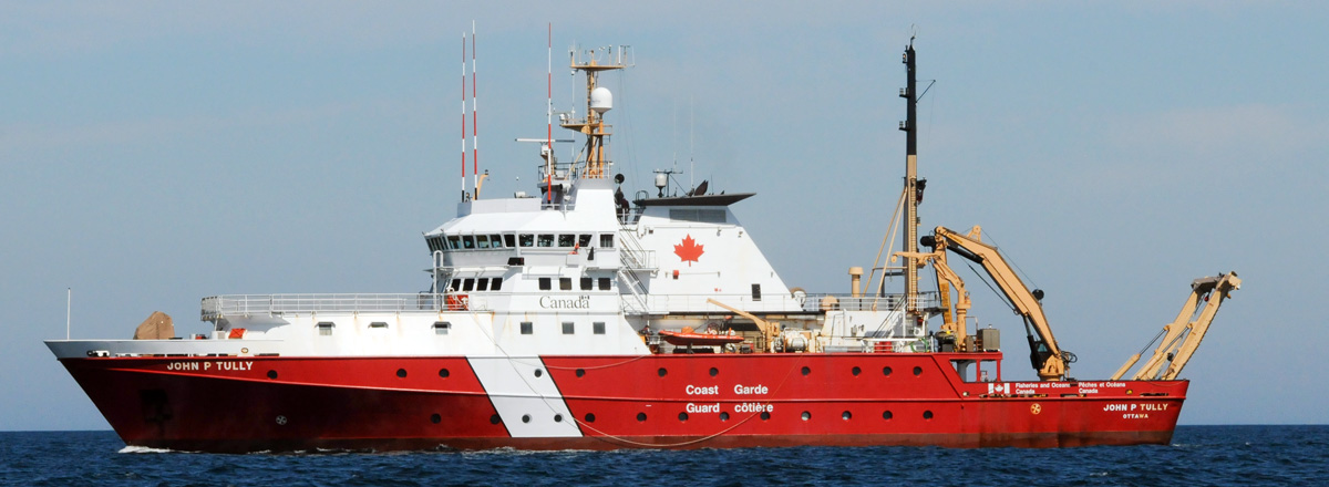 Canadian Coast Guard CCGS John P. Tully offshore oceanographic/research science vessel in calm waters